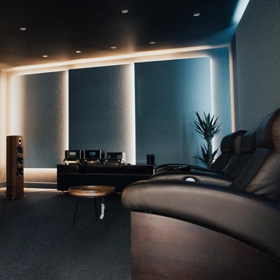 Home cinema projector equipment sitting on a table