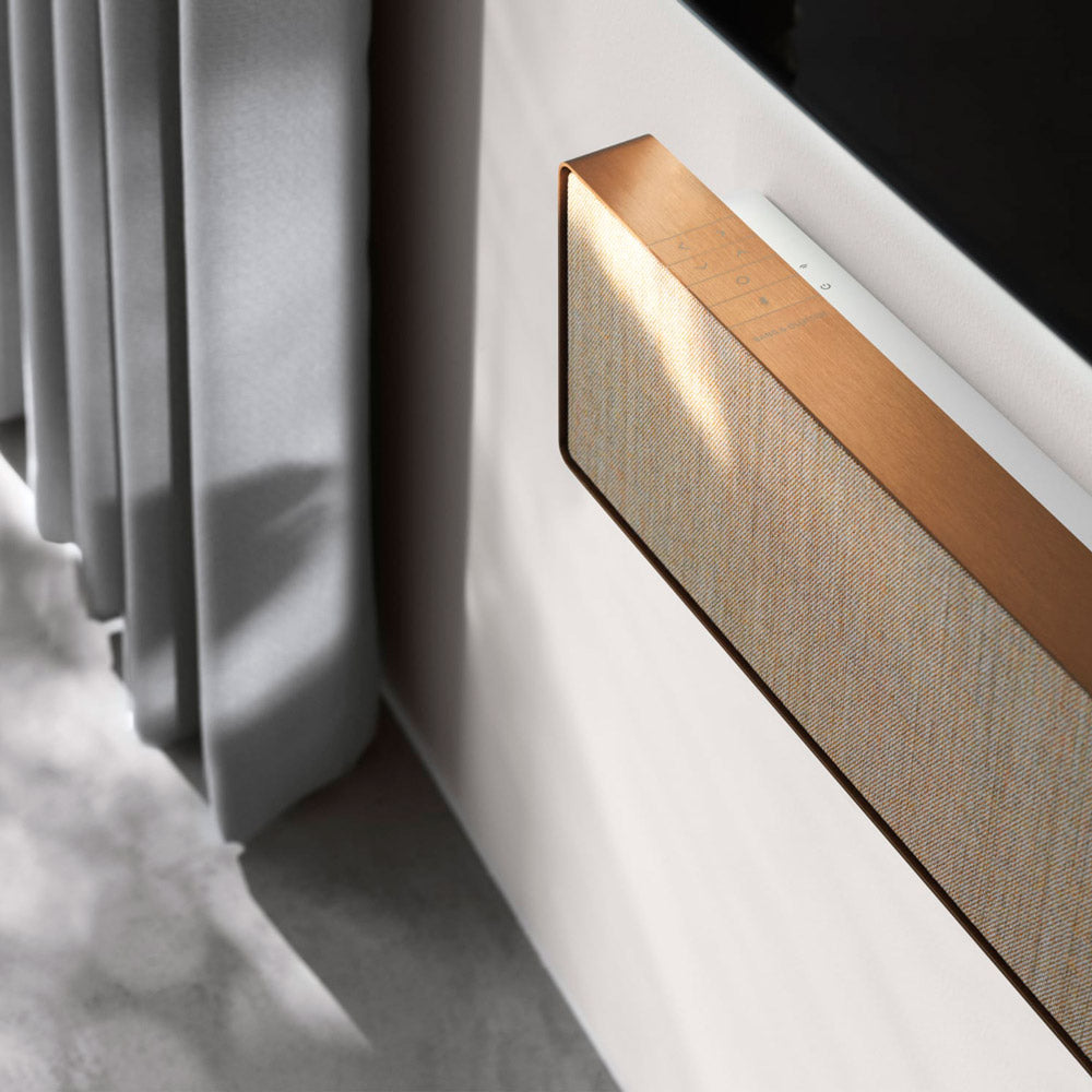 A soundbar made by bang & Olufsen that you can plug into any TV